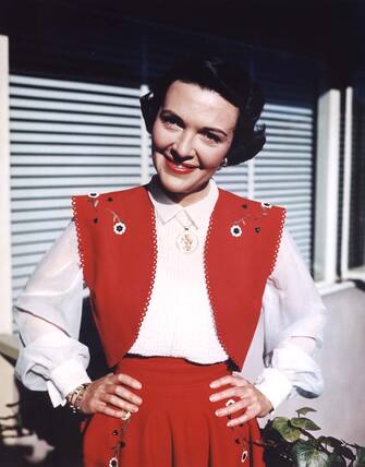 1949 Nancy Davis standing outside her Beverly Glen apartment in Los Angeles California