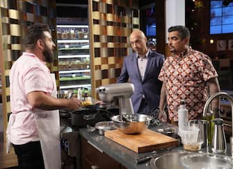 MASTERCHEF: L-R:  Contestant Michael with Joe Bastianich and Aaron Sanchez in the special 2-hour ”Semi Final / Finale Pt. 1” episode of MASTERCHEF airing Wednesday, Sep. 7 (8:00-10:00 PM ET/PT) on FOX. © 2022 FOX MEDIA LLC. CR: FOX.