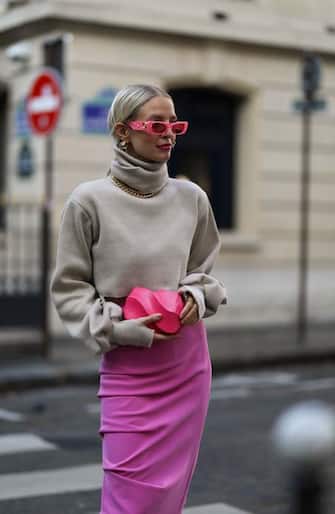 PARIS, FRANCE - OCTOBER 06: Leonie Hanne seen wearing a Gucci shades, Bottega Veneta bag and heels, purple skirt during Paris Fashion Week - Womenswear Spring Summer 2021 : Day Nine on October 06, 2020 in Paris, France. (Photo by Jeremy Moeller/Getty Images)