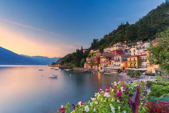 Sunset over the traditional village of Varenna on shore of Lake Como, Lecco province, Lombardy, Italy