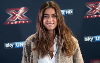 Gaia Gozzi, della categoria Under Donne, posa per i fotografi a margine della conferenza stampa di presentazione della nuova edizione di X Factor, Milano, 26 ottobre 2016.
ANSA / MATTEO BAZZI