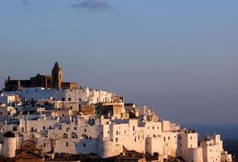 82042000 OSTUNI - SALENTO - ITALY, AUGUST 13: A view of Ostuni (called also the white town) on August 13, 2007, in Salento, Italy. Salento is that strip of land that forms the heel of the boot (lo Stivale). It is located between two seas: the Ionic (Ovest) and the Adriatic (East). There are more than 250 Km of coast which is at times low and sandy and at times high and indented. Salento is a peninsular region belonging to the South-eastern part of Puglia. (Photo by Franco S. Origlia/Getty Images)