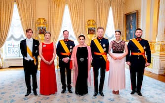 1151685430 LUXEMBOURG, LUXEMBOURG - JUNE 23: (L-R) Prince Louis of Luxembourg, Hereditary Grand Duchess Stephanie of Luxembourg, Hereditary Grand Duke Guillaumeof Luxembourg, Grand Duchess Maria Teresa of Luxembourg, Grand Duke Henri of Luxembourg, Princess Alexandra of Luxembourg and Prince Sebastien of Luxembourg during the reception at the Grand Ducal Palace on the National Day on June 23, 2019 in Luxembourg, Luxembourg. (Photo by Patrick van Katwijk/Getty Images)
