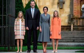 1176367953 Princess Leonor of Spain (L) poses with her parents king Felipe VI and queen Letizia, and sister princess Sofia (R) outside the Oviedo cathedral on October 17, 2019 on the eve of the Princess of Asturias awards ceremony. (Photo by MIGUEL RIOPA / AFP) (Photo by MIGUEL RIOPA/AFP via Getty Images)