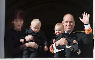 497852018 MONACO - NOVEMBER 19: Princess Charlene of Monaco, Prince Albert II of Monaco, Princess Gabriela and Prince Jacques appear on the Balcony during the Monaco national day on November 19, 2015 in Monaco, Monaco. (Photo by Thierry Orban/Getty Images)