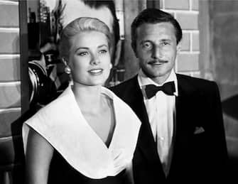 109558809 AUGUST 1: Actress Grace Kelly and fashion designer Oleg Cassini attend the premiere of the movie 'Rear Window' which was released on August 1, 1954. (Photo by Frank Worth, Courtesy of Capital Art/Getty Images)