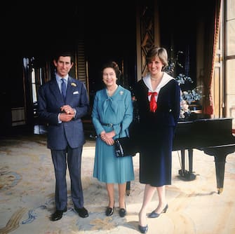 LONDON - 1981:  (FILE PHOTO) Prince Charles and his fiancee Lady Diana Spencer with Queen Elizabeth II at Buckingham Palace, 7th March 1981. (Photo by Fox Photos/Hulton Archive/Getty Images)

On July 1st  Diana, Princess Of Wales would have celebrated her 50th Birthday
Please refer to the following profile on Getty Images Archival for further imagery. 
http://www.gettyimages.co.uk/Search/Search.aspx?EventId=107811125&EditorialProduct=Archival
For further images see also:
Princess Diana:
http://www.gettyimages.co.uk/Account/MediaBin/LightboxDetail.aspx?Id=17267941&MediaBinUserId=5317233
Following Diana's Death:
http://www.gettyimages.co.uk/Account/MediaBin/LightboxDetail.aspx?Id=18894787&MediaBinUserId=5317233
Princess Diana  - A Style Icon:
http://www.gettyimages.co.uk/Account/MediaBin/LightboxDetail.aspx?Id=18253159&MediaBinUserId=5317233