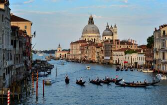 173428401 A picture taken on July 10, 2013 show one of the main waterways in Venice. AFP PHOTO / GIUSEPPE CACACE (Photo credit should read GIUSEPPE CACACE/AFP via Getty Images)