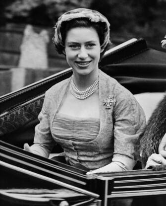 3429163 17th June 1952: Princess Margaret (1930 - 2002) is driven to the opening meeting of the Royal Ascot horse-racing event near Windsor in Berkshire. (Photo by Fox Photos/Getty Images)