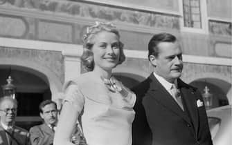 111146370 American actress Grace Kelly (1929  1982) on the day of her civil wedding to Rainier III, Prince of Monaco, at the Prince's Palace of Monaco, 18th April 1956. The man on the right is Count Fernand-Léopold-Marie-Joseph Caillard D'Aillieres, Prince Rainier's chamberlain. Original publication: Picture Post - 8336 - The Hour Of Marriage - pub. 28th April 1956 (Photo by Haywood Magee/Picture Post/Hulton Archive/Getty Images)