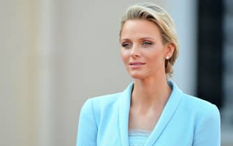 117855666 MONACO - JULY 01: Princess Charlene of Monaco looks on after the civil ceremony of the Royal Wedding of Prince Albert II of Monaco to Charlene Wittstock at the Prince's Palace on July 1, 2011 in Monaco. The ceremony took place in the Throne Room of the Prince's Palace of Monaco, followed by a religious ceremony to be conducted in the main courtyard of the Palace on July 2. With her marriage to the head of state of Principality of Monaco, Charlene Wittstock has/will become Princess consort of Monaco and gain the title, Princess Charlene of Monaco. Celebrations including concerts and firework displays are being held across several days, attended by a guest list of global celebrities and heads of state. (Photo by Pascal Le Segretain/Getty Images)