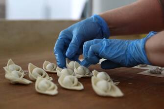1124874037 MOSCOW, RUSSIA - FEBRUARY 14, 2019: Manufacturing handmade ravioli under Fioritta Pasta Fresca trademark at a shop of the Liguriya company. Anton Novoderezhkin/TASS (Photo by Anton Novoderezhkin\TASS via Getty Images)