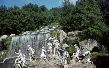 Sculpture by a cascade, Palace of Caserta, Campania, Italy. The Palace of Caserta was built in the 18th century for the Bourbon kings of Naples. It was one of the largest buildings constructed in Europe in the 18th century. The palace stands in a large park with fountains and artificial cascades. (Photo by Vivienne Sharp/Heritage Images/Getty Images)