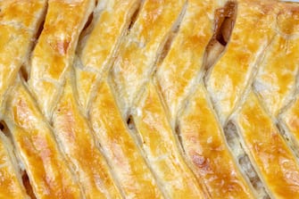 TORONTO, ONTARIO, CANADA - 2020/05/24: Apple strudel sweet food viewed from above. The food is very popular in the country. (Photo by Roberto Machado Noa/LightRocket via Getty Images)