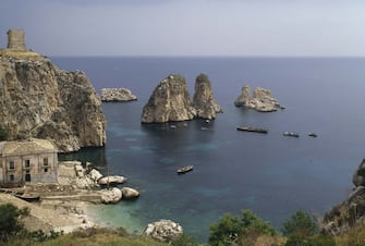 900874848 Tuna fishery and sea stacks in Scopello, Sicily, Italy.
