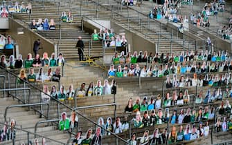 TOPSHOT - Cardboard cut-outs with portraits of Borussia Moenchegladbach's supporters are seen at the Borussia Park football stadium in Moenchengladbach, western Germany, on April 16, 2020, amid the novel coronavirus COVID-19 pandemic. - Large-scale public events such as football matches will remain banned in Germany until August 31 due to the coronavirus crisis, Berlin said on Wednesday, April 15, 2020, though it did not rule out allowing Bundesliga games to continue behind closed doors. (Photo by Ina FASSBENDER / AFP) (Photo by INA FASSBENDER/AFP via Getty Images)