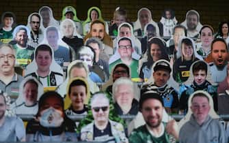 Cardboard cut-outs with portraits of Borussia Moenchegladbach's supporters are seen at the Borussia Park football stadium in Moenchengladbach, western Germany, on April 16, 2020, amid the novel coronavirus COVID-19 pandemic. - Large-scale public events such as football matches will remain banned in Germany until August 31 due to the coronavirus crisis, Berlin said on Wednesday, April 15, 2020, though it did not rule out allowing Bundesliga games to continue behind closed doors. (Photo by Ina FASSBENDER / AFP) (Photo by INA FASSBENDER/AFP via Getty Images)