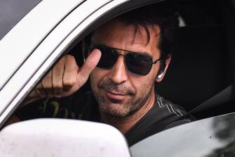 Juventus' Italian goalkeeper Gianluigi Buffon waves as he arrives in his car to attend training on May 19, 2020 at the club's Continassa training ground in Turin, as the country's lockdown is easing after over two months, aimed at curbing the spread of the COVID-19 infection, caused by the novel coronavirus. (Photo by Marco Bertorello / AFP) (Photo by MARCO BERTORELLO/AFP via Getty Images)