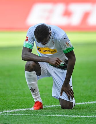 epa08456446 Moenchengladbach's Marcus Thuram reacts after scoring the 2-0 lead during the German Bundesliga soccer match between Borussia Moenchengladbach and Union Berlin in Moenchengladbach, Germany, 31 May 2020.  EPA/MARTIN MEISSNER / POOL CONDITIONS - ATTENTION: The DFL regulations prohibit any use of photographs as image sequences and/or quasi-video.