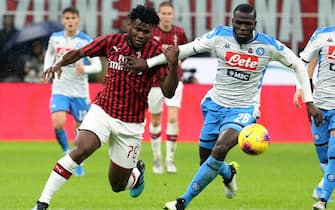 Milan's Franck Kessie (L) challenges for the ball with Napoli's Kalidou Koulibaly during the Italian serie A soccer match between AC Milan vs SSC Napoli at Giuseppe Meazza stadium in Milan, 23 November  2019.  ANSA / MATTEO BAZZI