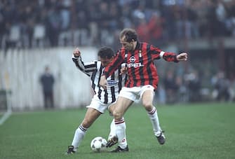 1 Apr 1995:  Robertio Baggio (left) of Juventus takes on Franco Baresi (right) of AC Milan during a Serie A match at the San Siro Stadium in Milan, Italy. Juventus won the match 2-0.  \ Mandatory Credit: Allsport UK /Allsport