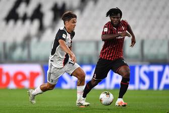 TURIN, ITALY - JUNE 12:  Paulo Dybala (L) of Juventus in action against Franck Kessie of AC Milan during the Coppa Italia Semi-Final Second Leg match between Juventus and AC Milan at Allianz Stadium on June 12, 2020 in Turin, Italy.  (Photo by Valerio Pennicino/Getty Images)