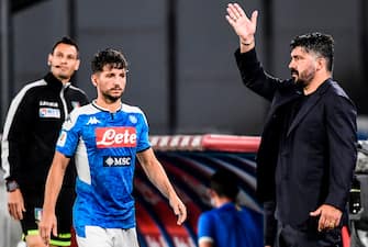 Napoli's Italian head coach Gennaro Gattuso (R) gestures next to Napoli's Belgian forward Dries Mertens (L) during the Italian Cup (Coppa Italia) semi-final second leg football match Napoli vs Inter Milan on June 13, 2020 at the San Paolo stadium in Naples, played behind closed doors as the country gradually eases its lockdown aimed at curbing the spread of the COVID-19 infection, caused by the novel coronavirus. (Photo by Filippo MONTEFORTE / AFP) (Photo by FILIPPO MONTEFORTE/AFP via Getty Images)