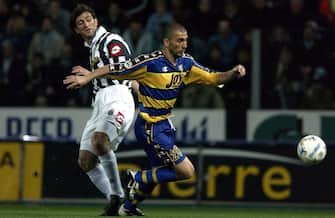 23 Mar 2002:  Marco Di Vaio of Parma and Ciro Ferrara of Juventus in action during the Serie A 28th Round League match played between Parma and Juventus at the Ennio Tardini Stadium in Parma,Italy. DIGITAL IMAGE Mandatory Credit: Grazia Neri/Getty Images
