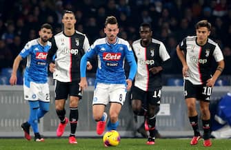 NAPLES, ITALY - JANUARY 26: Fabian Ruiz of SSC Napoli competes for the ball with Blaise Matuidi ,Cristano Ronaldo and Paulo Dybala of Juventus ,during the Serie A match between SSC Napoli and  Juventus at Stadio San Paolo on January 26, 2020 in Naples, Italy. (Photo by MB Media/Getty Images)