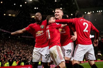 MANCHESTER, ENGLAND - MARCH 08: Scott McTominay of Manchester United celebrates scoring their second goal during the Premier League match between Manchester United and Manchester City at Old Trafford on March 08, 2020 in Manchester, United Kingdom. (Photo by Ashley Donelon/Manchester United via Getty Images)