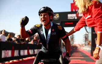 CERVIA, ITALY - SEPTEMBER 21: Alex Zanardi of Italy celebrates finishing  IRONMAN Italy on September 21, 2019 in Cervia, Italy. (Photo by Bryn Lennon/Getty Images for IRONMAN)