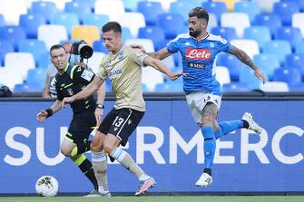 NAPLES, ITALY - JUNE 28: Arkadiusz Reka of SPAL vies with Elseid Hysaj of SSC Napoli during the Serie A match between SSC Napoli and  SPAL at Stadio San Paolo on June 28, 2020 in Naples, Italy. (Photo by Francesco Pecoraro/Getty Images)