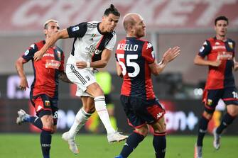1223658905 Juventus' Portuguese forward Cristiano Ronaldo shoots to score during the Italian Serie A football match Genoa vs Juventus played on June 30, 2020 behind closed doors at the Luigi-Ferraris stadium in Genoa, as the country eases its lockdown aimed at curbing the spread of the COVID-19 infection, caused by the novel coronavirus. (Photo by Miguel MEDINA / AFP) (Photo by MIGUEL MEDINA/AFP via Getty Images)