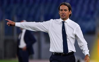 Lazio's Italian head coach Simone Inzaghi gives instructions to his players from the touchline during the Italian Serie A football match Lazio vs Fiorentina played on June 27, 2020 behind closed doors at the Olympic stadium in Rome, as the country eases its lockdown aimed at curbing the spread of the COVID-19 infection, caused by the novel coronavirus. (Photo by Alberto PIZZOLI / AFP) (Photo by ALBERTO PIZZOLI/AFP via Getty Images)