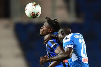 Atalanta's Colombian forward Duvan Zapata (L) and Napoli's Senegalese defender Kalidou Koulibaly go for a header during the Italian Serie A football match Atalanta vs Napoli played on July 2, 2020 behind closed doors at the Atleti Azzurri d'Italia stadium in Bergamo, as the country eases its lockdown aimed at curbing the spread of the COVID-19 infection, caused by the novel coronavirus. (Photo by Miguel MEDINA / AFP) (Photo by MIGUEL MEDINA/AFP via Getty Images)