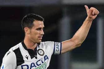 Udinese's Italian forward Kevin Lasagna celebrates after opening the scoring during the Italian Serie A football match Roma vs Udinese played on July 2, 2020 behind closed doors at the Olympic stadium in Rome, as the country eases its lockdown aimed at curbing the spread of the COVID-19 infection, caused by the novel coronavirus. (Photo by Andreas SOLARO / AFP) (Photo by ANDREAS SOLARO/AFP via Getty Images)