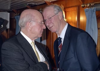LONDON - MARCH 20: Former footballer Sir Bobby Charlton and Jack Charlton who played in the 1966 World Cup final, cruise the River Thames by boat, culminating in the Heroes '66 Reunion Dinner being held at the Tower of London on March 20, 2006 in London, England. The special dinner - which is the first ever reunion of the 1966 World Cup finalists, is hosted by the German Embassy commemorating 40 years since England won the Jules Rimet trophy. (Photo by Dave Benett/Getty Images) 