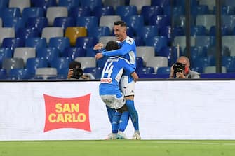 NAPLES, ITALY - JULY 12: Jose Callejon and Dries Mertens of SSC Napoli celebrate the 2-1 goal scored by Dries Mertens during the Serie A match between SSC Napoli and  AC Milan at Stadio San Paolo on July 12, 2020 in Naples, Italy. (Photo by Francesco Pecoraro/Getty Images)