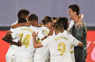 MADRID, SPAIN - JULY 16: Thibaut Courtois of Real Madrid celebrates with teammatesafter Real scored their 3rd goal which was later disallowed by VAR during the Liga match between Real Madrid CF and Villarreal CF at Estadio Alfredo Di Stefano on July 16, 2020 in Madrid, Spain. (Photo by Denis Doyle/Getty Images)