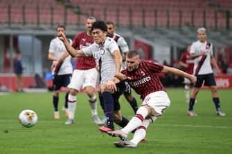 MILAN, ITALY - JULY 18: Croatian striker Ante Rebic of AC Milan scores to give his side a 4-1 lead during the Serie A match between AC Milan and  Bologna FC at Stadio Giuseppe Meazza on July 18, 2020 in Milan, Italy. (Photo by Jonathan Moscrop/Getty Images)