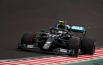 BUDAPEST, HUNGARY - JULY 18: Valtteri Bottas of Finland driving the (77) Mercedes AMG Petronas F1 Team Mercedes W11 on track during qualifying for the F1 Grand Prix of Hungary at Hungaroring on July 18, 2020 in Budapest, Hungary. (Photo by Bryn Lennon/Getty Images)