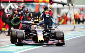 BUDAPEST, HUNGARY - JULY 19: Max Verstappen of the Netherlands driving the (33) Aston Martin Red Bull Racing RB16 drives in the pit lane during the Formula One Grand Prix of Hungary at Hungaroring on July 19, 2020 in Budapest, Hungary. (Photo by Peter Fox/Getty Images)