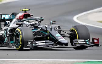 Mercedes' Finnish driver Valtteri Bottas steers his car during the Formula One Hungarian Grand Prix race at the Hungaroring circuit in Mogyorod near Budapest, Hungary, on July 19, 2020. (Photo by Joe Klamar / POOL / AFP) (Photo by JOE KLAMAR/POOL/AFP via Getty Images)