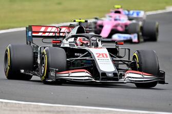 Haas F1's Danish driver Kevin Magnussen steers his car in front of Racing Point's Canadian driver Lance Stroll during the Formula One Hungarian Grand Prix race at the Hungaroring circuit in Mogyorod near Budapest, Hungary, on July 19, 2020. (Photo by Joe Klamar / POOL / AFP) (Photo by JOE KLAMAR/POOL/AFP via Getty Images)
