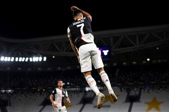 Juventus' Portuguese forward Cristiano Ronaldo celebrates after scoring the first goal during the Italian Serie A football match between Juventus and Lazio, on July 20, 2020 at the Allianz stadium, in Turin, northern Italy. (Photo by Marco Bertorello / AFP) (Photo by MARCO BERTORELLO/AFP via Getty Images)