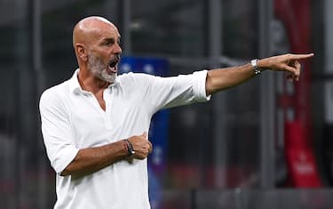 AC Milan's Italian coach Stefano Pioli  gestures during the Italian Serie A football match AC Milan vs Bologna played behind closed doors on July 15, 2020 at the San Siro Stadium in Milan, as the country eases its lockdown aimed at curbing the spread of the COVID-19 infection, caused by the novel coronavirus. (Photo by MARCO BERTORELLO / AFP) (Photo by MARCO BERTORELLO/AFP via Getty Images)