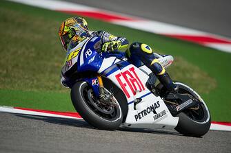 103824249 MISANO ADRIATICO, ITALY - SEPTEMBER 03: Valentino Rossi of Italy and Fiat Yamaha Team rounds the bend during the first free practice of MotoGP of San Marino in Misano World Circuit in Misano Adriatico on September 3, 2010 in Misano Adriatico, Italy. (Photo by Mirco Lazzari gp/Getty Images)