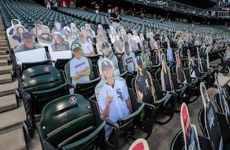 epa08565101 Cutout images of fans sit in seats before the start of the MLB baseball game between the Minnesota Twins and the Chicago White Sox at Guaranteed Rate Field in Chicago, Illinois, USA, 24 July 2020. Major League Baseball has started an abbreviated 2020 season playing in ballparks without fans.  EPA/TANNEN MAURY