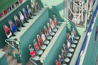 BOSTON, MA - JULY 24: Cardboard cut outs of fans sitting in the Green Monster on Opening Day at Fenway Park on July 24, 2020 in Boston, Massachusetts. The 2020 season had been postponed since March due to the COVID-19 pandemic. (Photo by Kathryn Riley/Getty Images)
