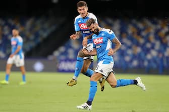 NAPLES, ITALY - JULY 25: Giovanni Di Lorenzo and Elseid Hysaj of SSC Napoli celebrate the 1-0 goal scored by Elseid Hysaj during the Serie A match between SSC Napoli and  US Sassuolo at Stadio San Paolo on July 25, 2020 in Naples, Italy. (Photo by Francesco Pecoraro/Getty Images)
